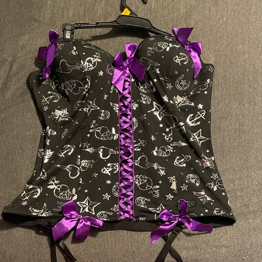 Torrid Black and Purple Lace-Up Bodysuit
PTP 17”
Length 13.5 “